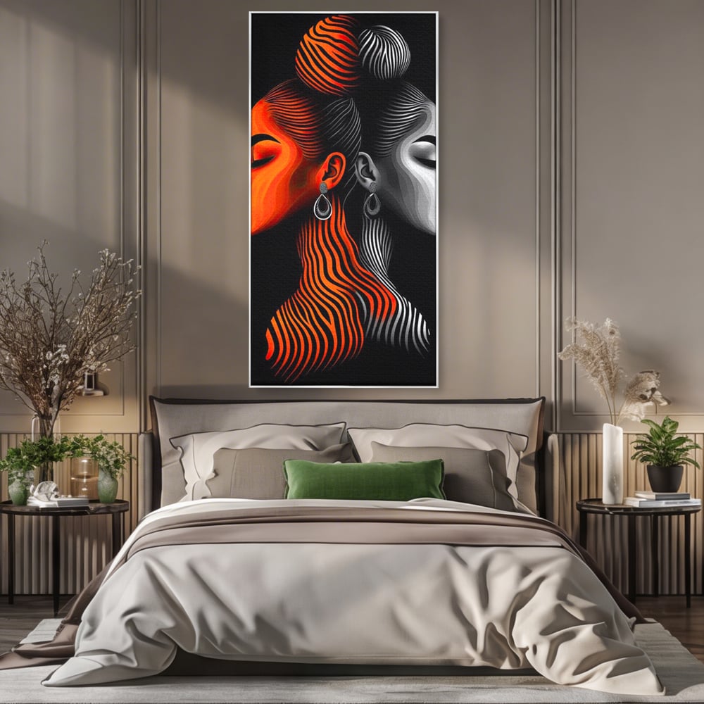 Tablou canvas cu tablou canvas cu doua fete stilizate, in rama de aluminiu argintiu, pe perete intr-un dormitor